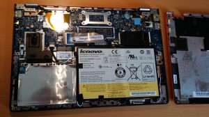 Back panel removed. You see the HDD covered with a metal foil in the bottom, left corner.
