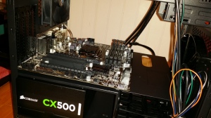 The motherboard screwed into place.